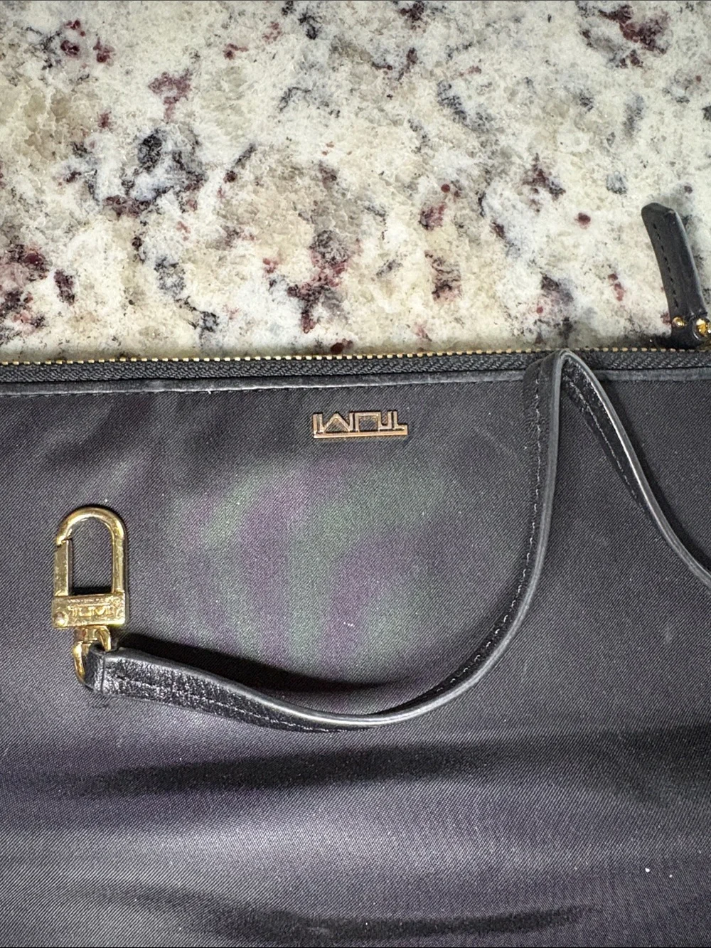 Tumi Black Leather Wristlet Clutch with Gold Hardware